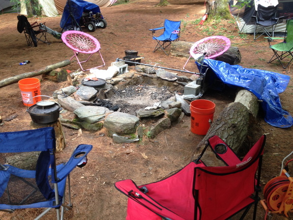 Seats around a fire pit.