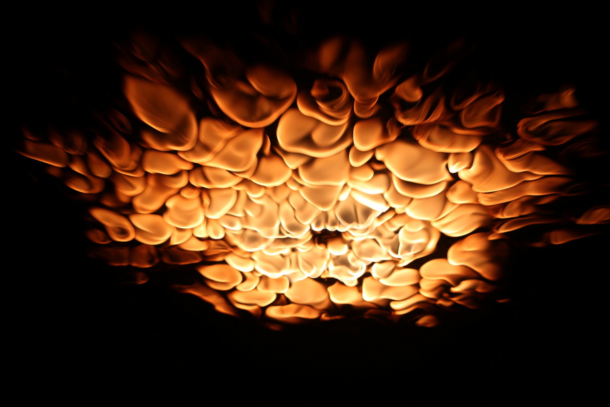 Flames shoot out on the underside of a Flame Ceiling.
