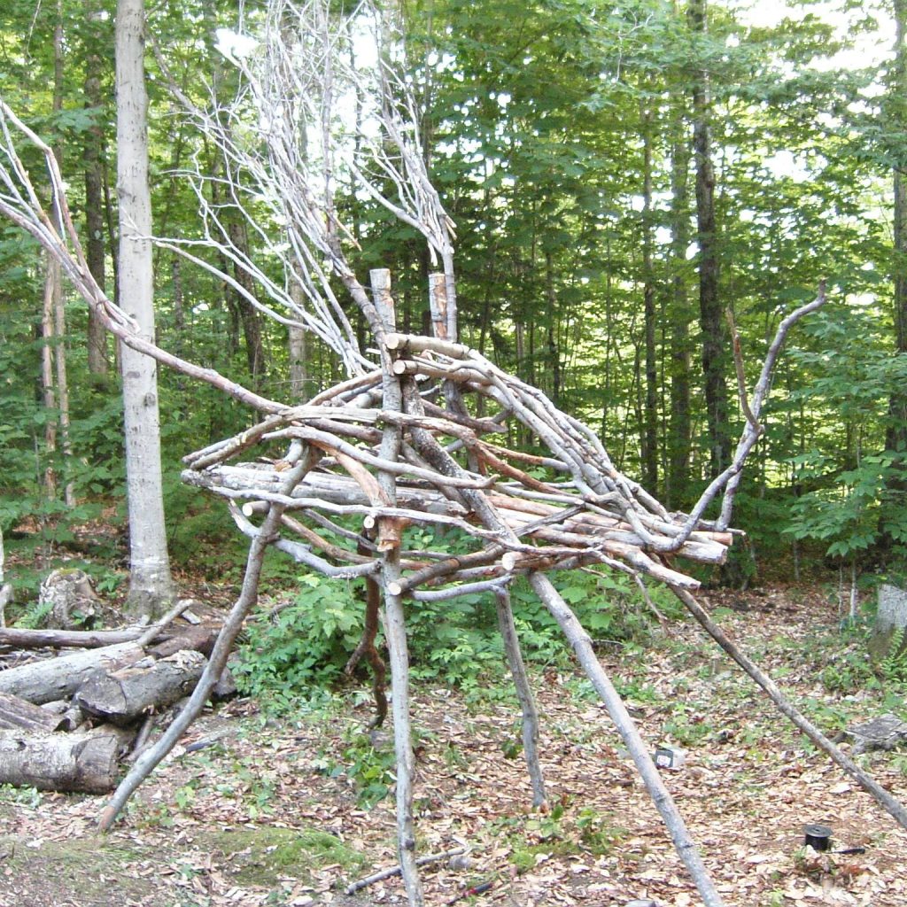The 2005 bug, a a wire-frame wooden effigy of a bug, slightly taller than a person.